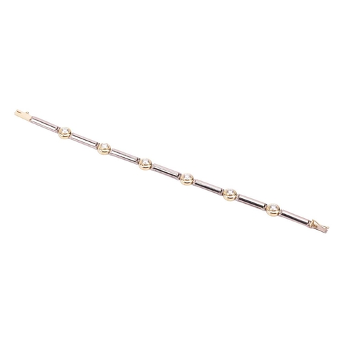 104 - A diamond-set bracelet in 18ct bi-coloured gold, constructed with a line of hinged bar links, flanki... 