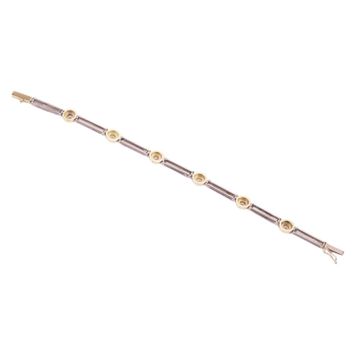 104 - A diamond-set bracelet in 18ct bi-coloured gold, constructed with a line of hinged bar links, flanki... 