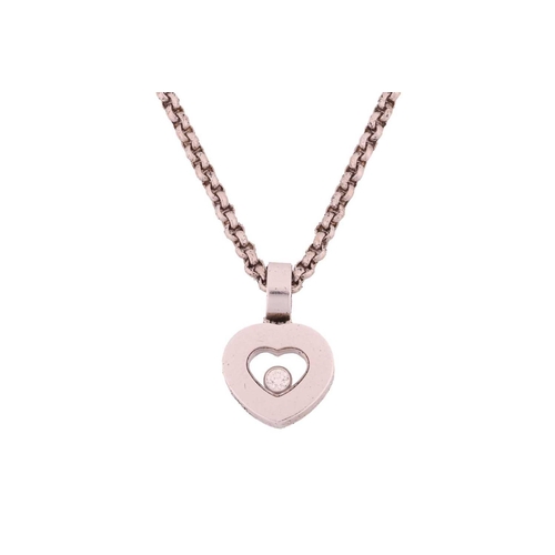 106 - Chopard - a 'Happy Diamond' heart pendant on chain, set to the centre with a heart-shaped motif, enc... 