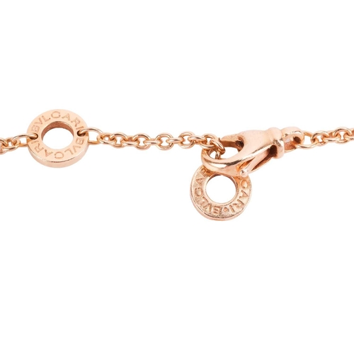 107 - Bulgari - a B.Zero 1 link bracelet, consisting of a cable link and a sprung spiral charm, flanked by... 