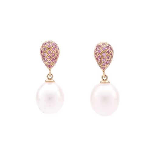 120 - A pendant on chain and matching earrings set with cultured pearl and pink sapphires; the pendant con... 