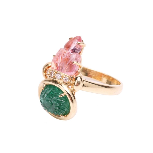 122 - An emerald, tourmaline and diamond dress ring, featuring an oval carved emerald within a collet unde... 