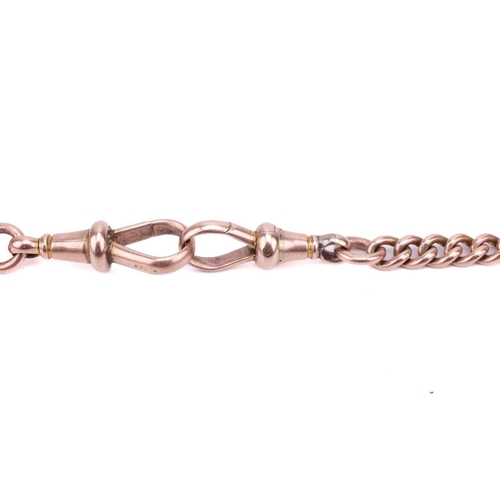 123 - A watch chain in 9ct rose gold, comprising a series of curb links terminated with swivel clasps, all... 