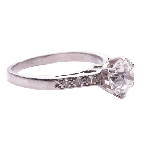 137 - A diamond solitaire ring, claw-set with an old-cut diamond of 6.4 mm, with an estimated weight of 1.... 