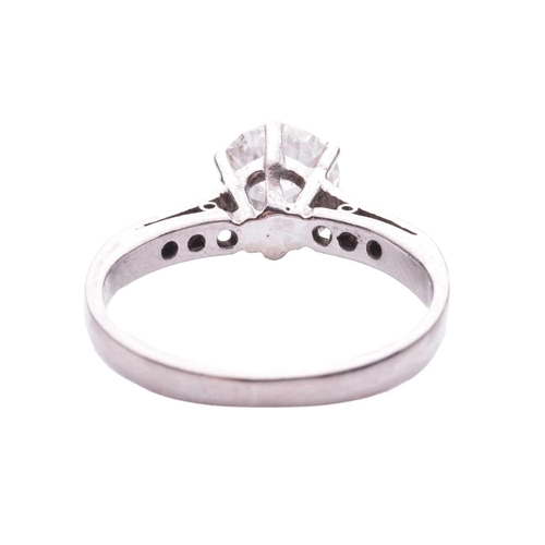 137 - A diamond solitaire ring, claw-set with an old-cut diamond of 6.4 mm, with an estimated weight of 1.... 