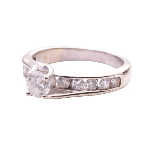 159 - A diamond solitaire ring, the central round brilliant diamond measuring approximately 4.85mm, with a... 