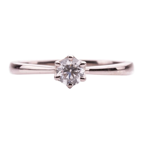 161 - A diamond solitaire ring in 18ct white gold, claw-set with a round brilliant-cut diamond of 0.30ct, ... 