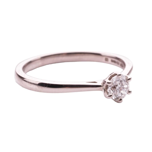 161 - A diamond solitaire ring in 18ct white gold, claw-set with a round brilliant-cut diamond of 0.30ct, ... 