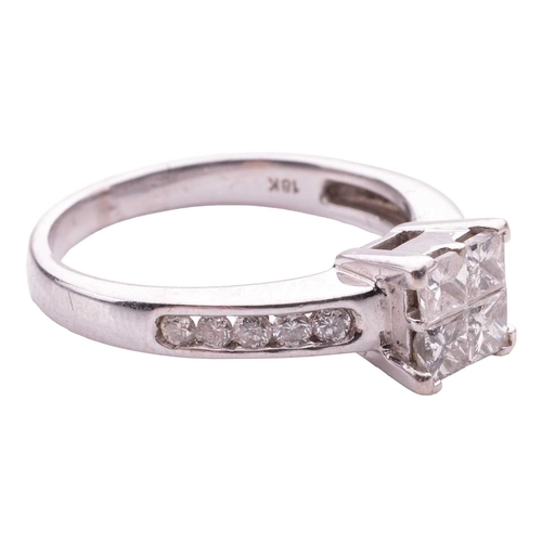 165 - A princess-cut diamond cluster ring, with four princess-cut diamonds illusion-set together, giving t... 