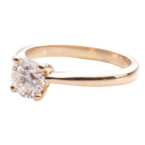 166 - A diamond solitaire ring in 18ct yellow gold, claw-set with a round brilliant-cut diamond of 6.4 mm,... 