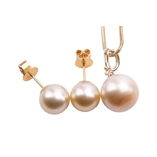 167 - A pair of South Sea cultured pearl stud earrings and a matching pendant on chain; the earrings each ... 