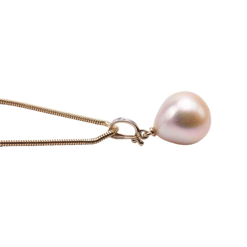 167 - A pair of South Sea cultured pearl stud earrings and a matching pendant on chain; the earrings each ... 