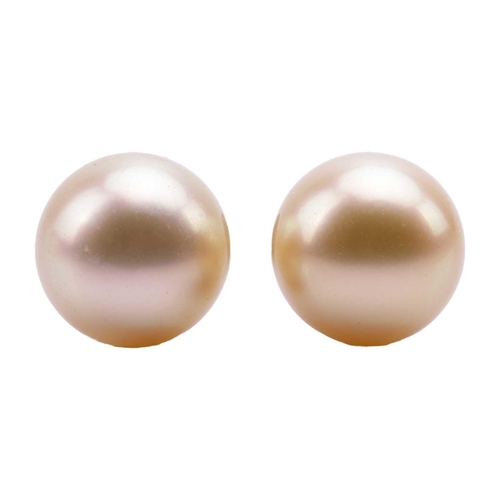 167 - A pair of South Sea cultured pearl stud earrings and a matching pendant on chain; the earrings each ... 