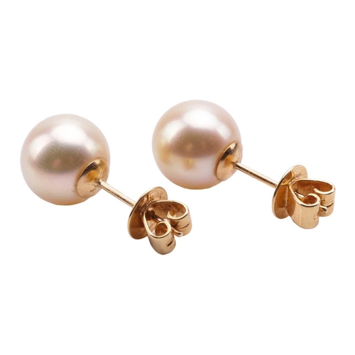 167 - A pair of South Sea cultured pearl stud earrings and a matching pendant on chain; the earrings each ... 