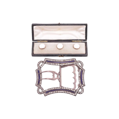 169 - A Victorian buckle and a set of dress studs; the buckle designed as a continuous ribbon set with pas... 