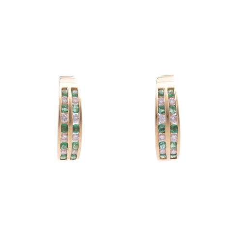 17 - Two pairs of gem-set hoop earrings; the first containing two rows of circular-cut emeralds and brill... 