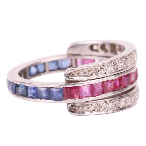 172 - A sapphire, ruby and diamond 'Day and Night' ring, one half channel set with calibré cut sapphires, ... 