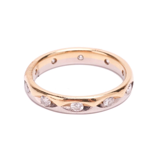 18 - A diamond wedding band in 18ct bi-coloured gold, set with ten brilliant-cut diamonds with an estimat... 