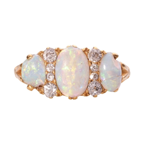 2 - An Edwardian opal and diamond half-hoop ring, comprising three graduated oval-cut precious opals wit... 