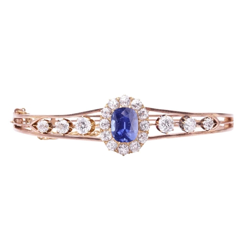 203 - A Victorian Kashmir Sapphire (with no indications of heat treatment) and diamond cluster hinged bang... 