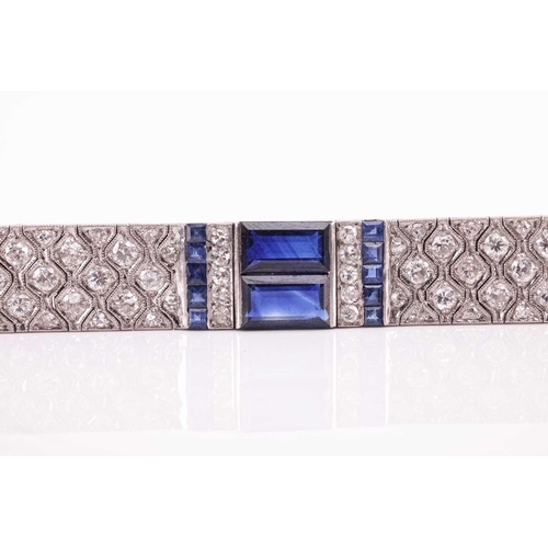 204 - An Art Deco sapphire and diamond line bracelet by Charles Holl, circa 1930, of highly flexible desig... 