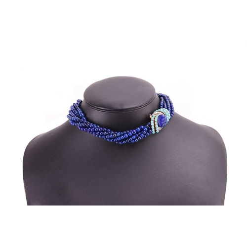 205 - Cartier - a torsade necklace and a single earring set with lapis lazuli, turquoise and diamonds, cir... 