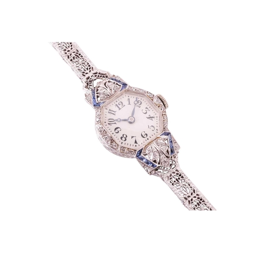 226 - A circa 1925 platinum dress watch with sapphires and diamonds, featuring a Swiss Made Ethic W. C han... 