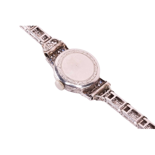 226 - A circa 1925 platinum dress watch with sapphires and diamonds, featuring a Swiss Made Ethic W. C han... 