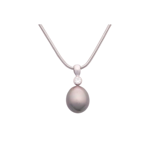 23 - A cultured Tahitian pearl and diamond pendant and earrings en-suite; the pendant on chain features a... 