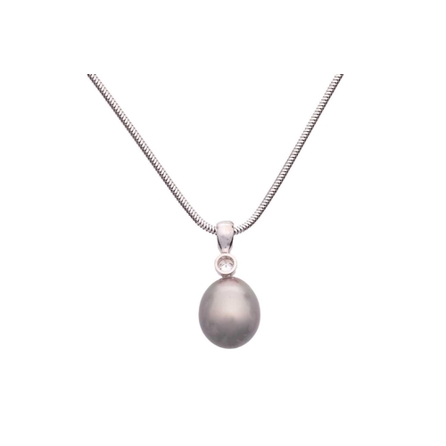 23 - A cultured Tahitian pearl and diamond pendant and earrings en-suite; the pendant on chain features a... 