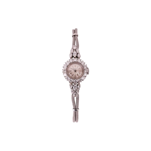 239 - A Patek Philippe 3289 diamond set lady's cocktail watch Model: 3289/34 Platinum Serial: 985.153 Year... 