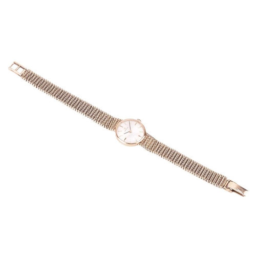 249 - An Omega lady’s 9ct gold manual wind watch, stamped 375 to the deployment and measuring 19mm, with a... 