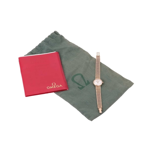 249 - An Omega lady’s 9ct gold manual wind watch, stamped 375 to the deployment and measuring 19mm, with a... 