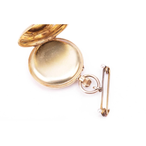 255 - A late Victorian 18ct gold half hunter fob watch, featuring a keyless wound movement in a yellow met... 