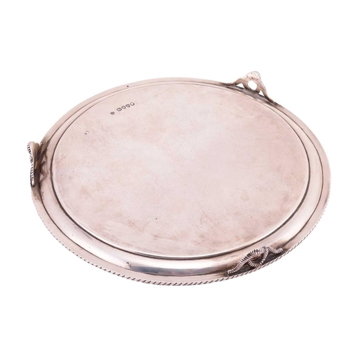 260 - A Victorian silver salver; circular with raised rope twist borders and scroll and foliate decorated ... 