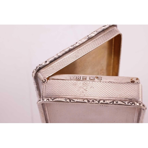 279 - A Victorian silver snuff box, rectangular with cast foliate borders. ribbed sides and partially engi... 