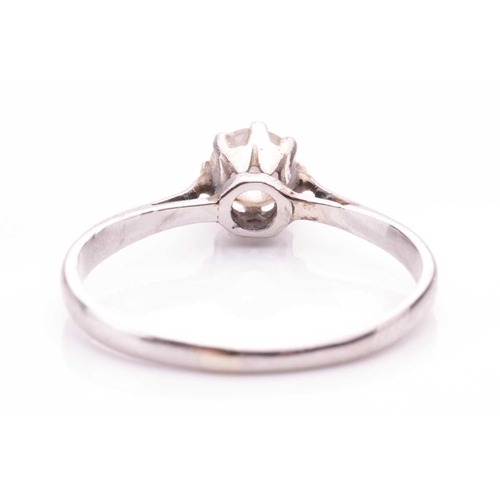 28 - A diamond solitaire ring, set with a round old cut diamond with an estimated weight of 0.30ct, in a ... 