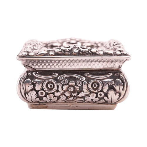 286 - A Victorian silver snuff box; rectangular, with applied cast foliate border, curved chased sides, an... 