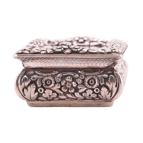 286 - A Victorian silver snuff box; rectangular, with applied cast foliate border, curved chased sides, an... 