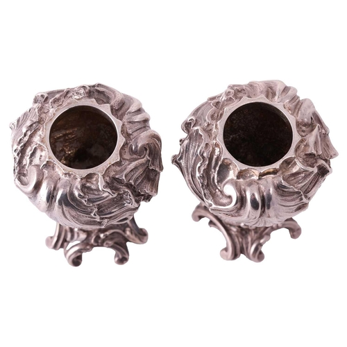 297 - A pair of Continental heavy-cast silver 