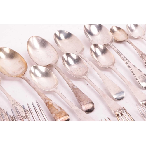 306 - A collection mixed collection of silver flatware including tablespoons, teaspoons, and other items o... 