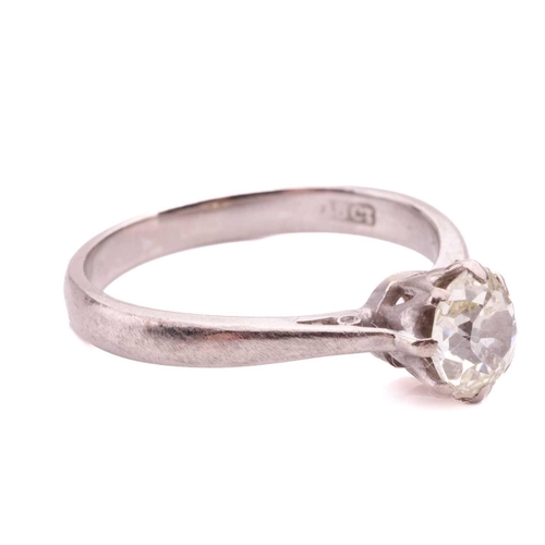 31 - An old-cut diamond solitaire ring, coronet-set with an oval old-cut diamond of tinted yellow colour,... 