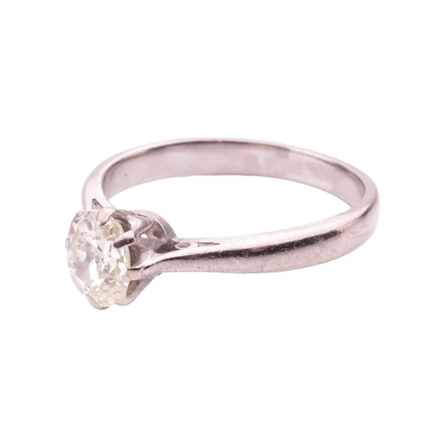 31 - An old-cut diamond solitaire ring, coronet-set with an oval old-cut diamond of tinted yellow colour,... 