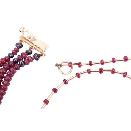 36 - Two ruby beaded necklaces with 18ct gold clasps; the first containing three strands of ruby beads wi... 