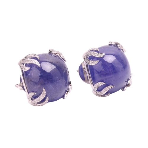 41 - A pair of tanzanite and diamond earrings, each set with a cabochon tanzanite measuring 16 x 16 x 9.6... 