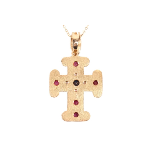 45 - A gem-set cross pendant on chain, containing circular-cut rubies and sapphires along with diamond ac... 