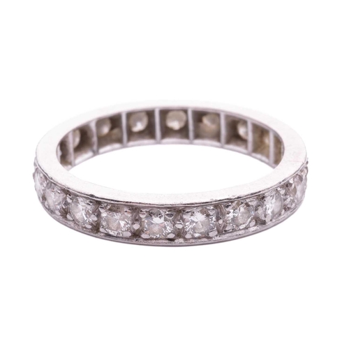 58 - A diamond eternity ring, pavé-set with a single row of brilliant-cut diamonds of 2.5 mm, with an est... 