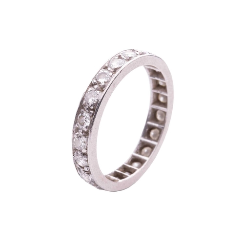 58 - A diamond eternity ring, pavé-set with a single row of brilliant-cut diamonds of 2.5 mm, with an est... 