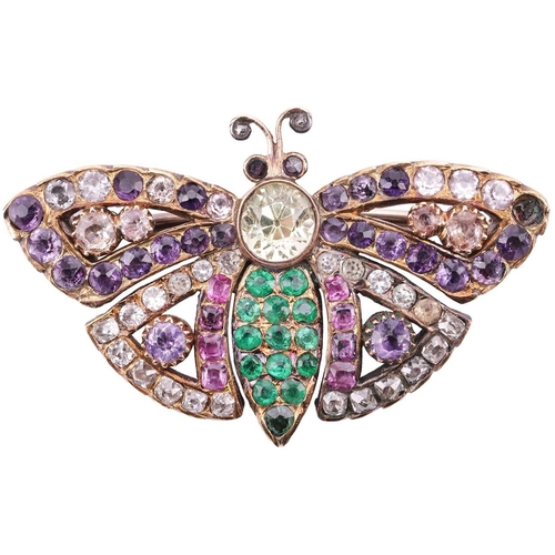 6 - A late Victorian gem-set butterfly brooch, consisting of a circular-cut chrysoberyl thorax and an em... 