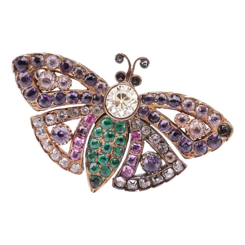 6 - A late Victorian gem-set butterfly brooch, consisting of a circular-cut chrysoberyl thorax and an em... 